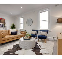 Large stylish and quiet penthouse steps from surf - Holiday Adelaide