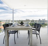 Minimalist Penthouse Condo with Skyline Vistas - Holiday Adelaide